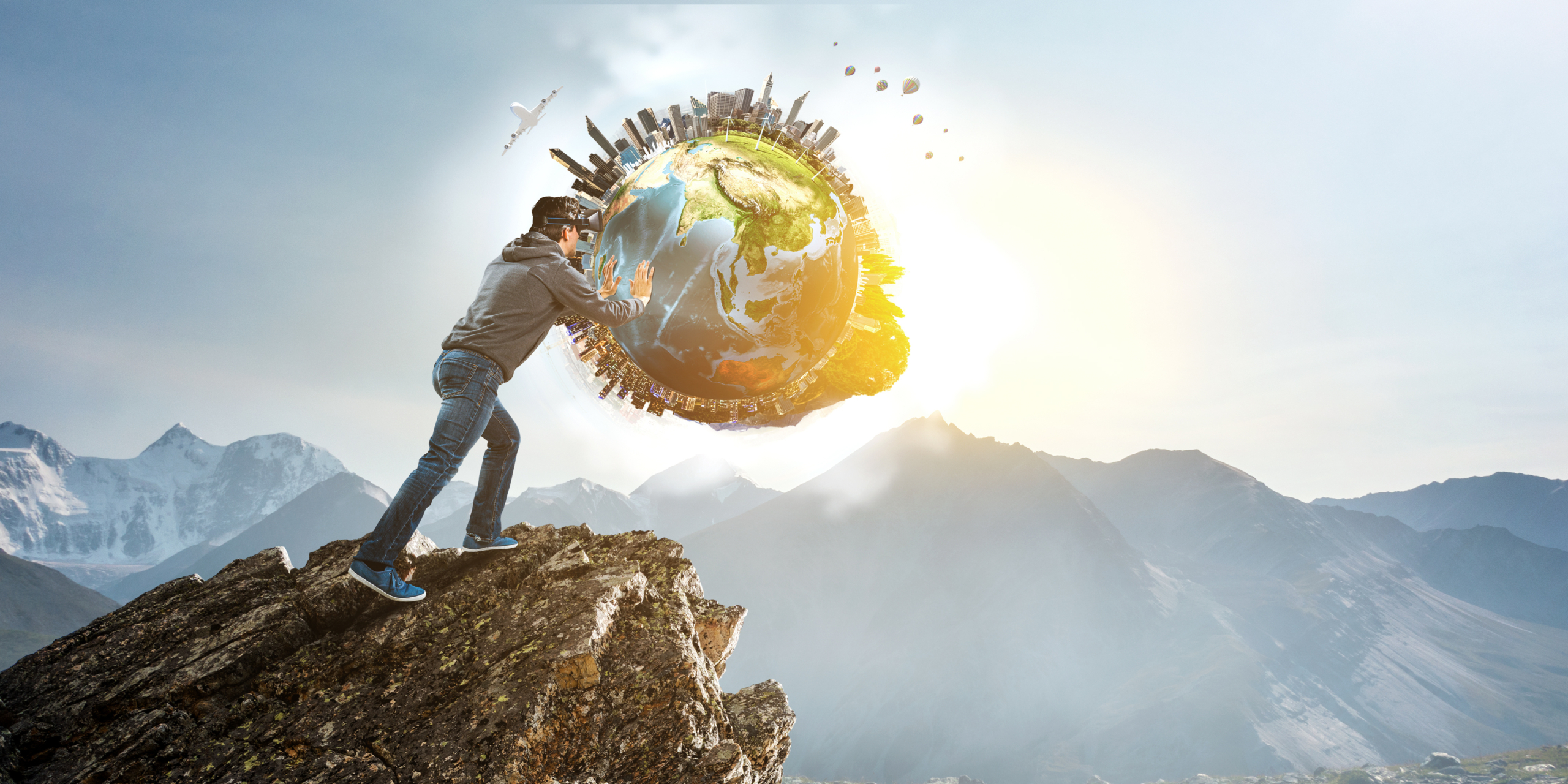 Person with VR headset facing digital globe.