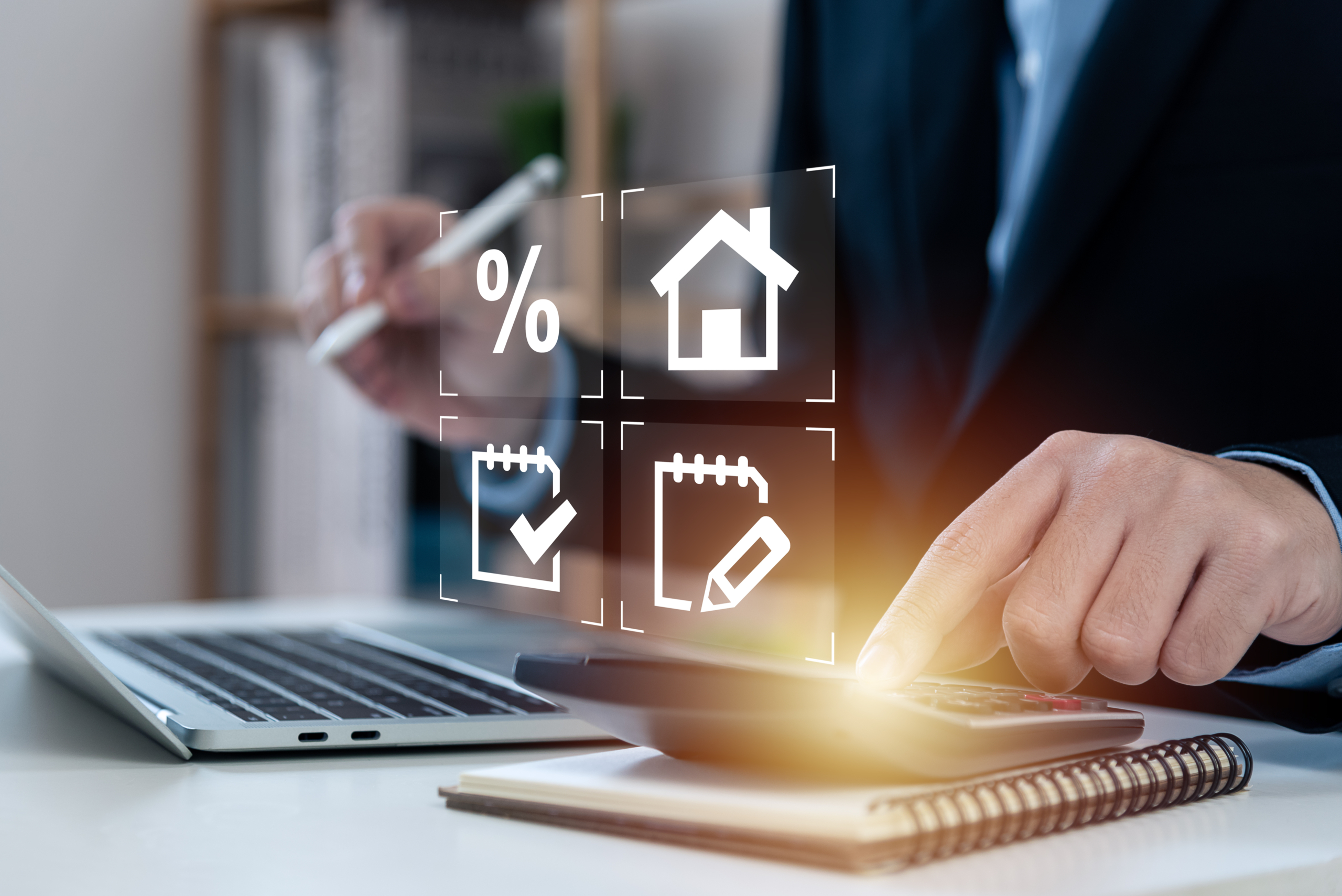 Man calculating finances with laptop and icons.