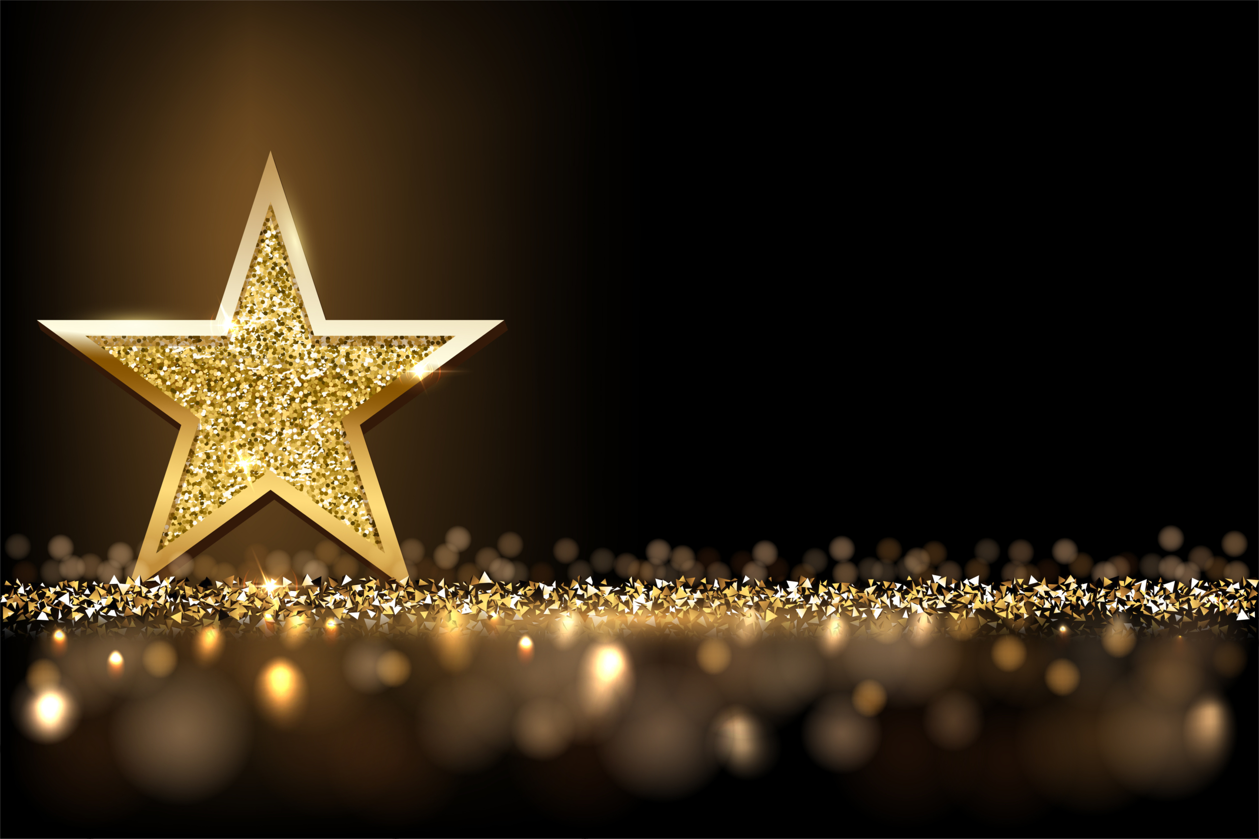 Leuchtender goldener Stern auf schwarzem Hintergrund mit funkelnden Glitzerpartikeln.