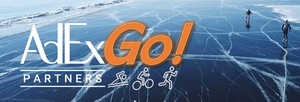People skating on frozen surface with "AdExGo Partners" logo.