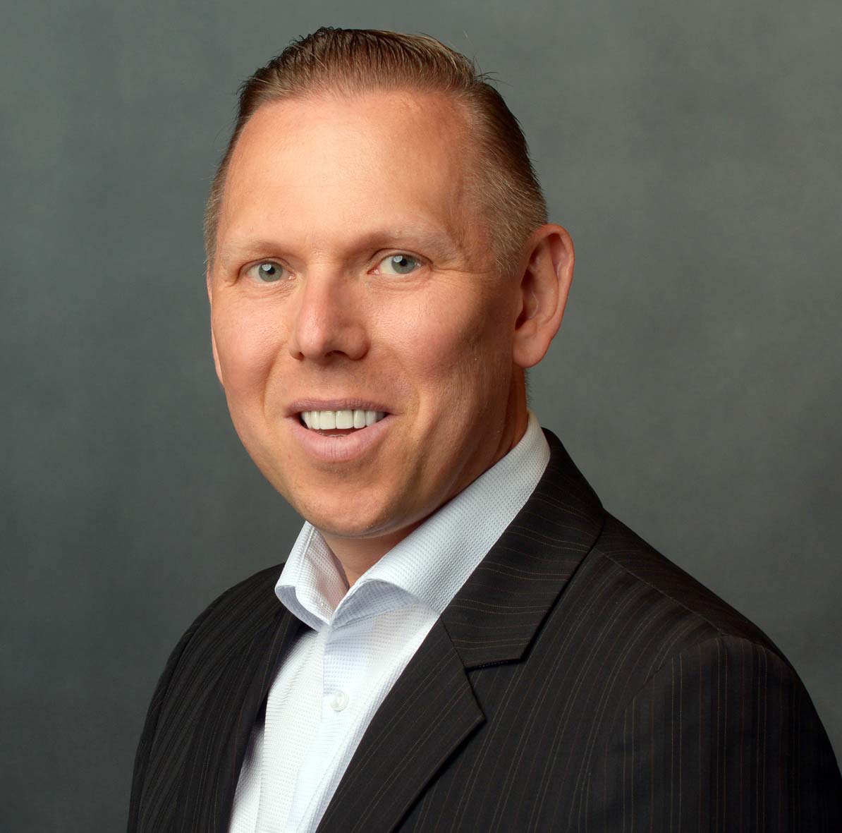 Professional man in suit smiling